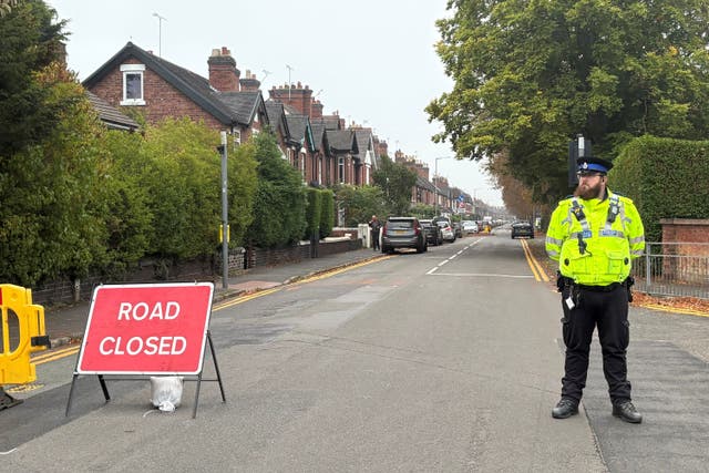 Police at the scene in Corporation Street in Stafford on Sunday (Matthew Cooper/PA)