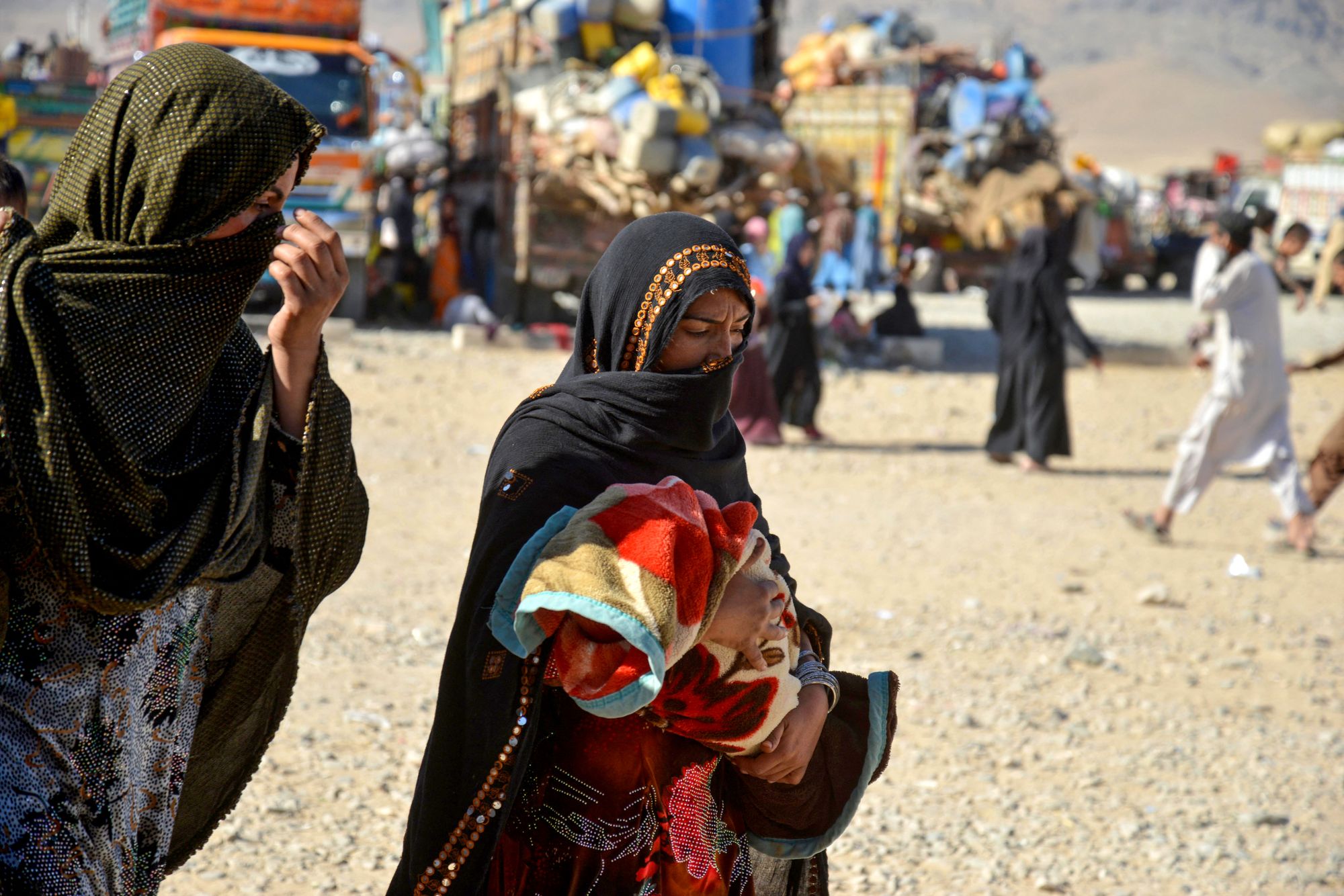 <p>Afghans deported from Pakistan arrive at a registration centre at Takhta Pul in Kandahar province </p>