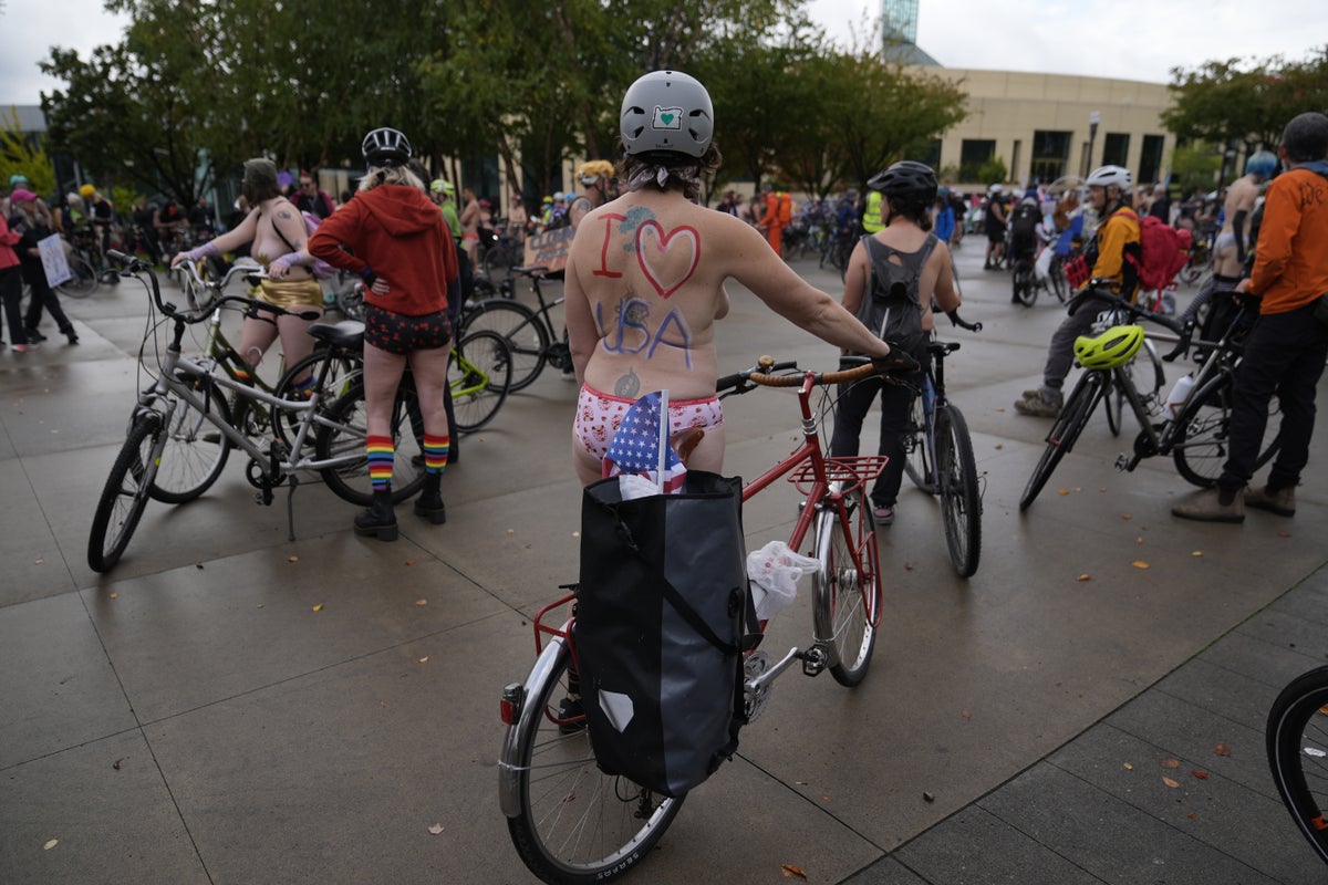Naked bike riders demonstrate against federal troops in 'quintessentially Portland' protest
