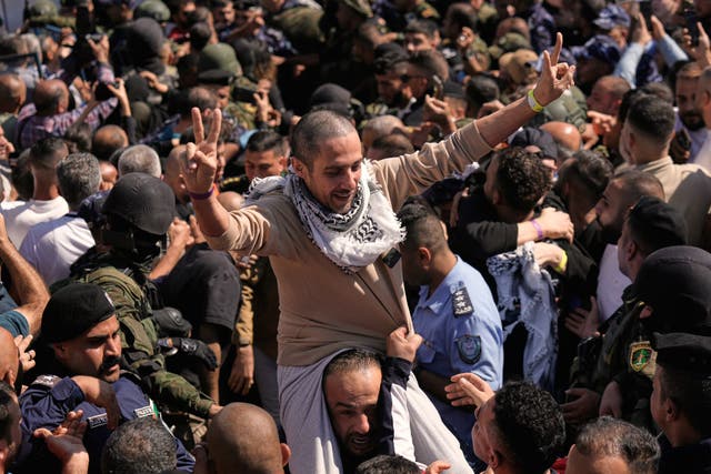 <p>A Palestinian prisoner makes the victory sign after being released from an Israeli prison as part of a ceasefire deal between Israel and Hamas, upon his arrival in the West Bank city of Ramallah, Monday, Oct. 13, 2025. (AP Photo/Majdi Mohammed)</p>