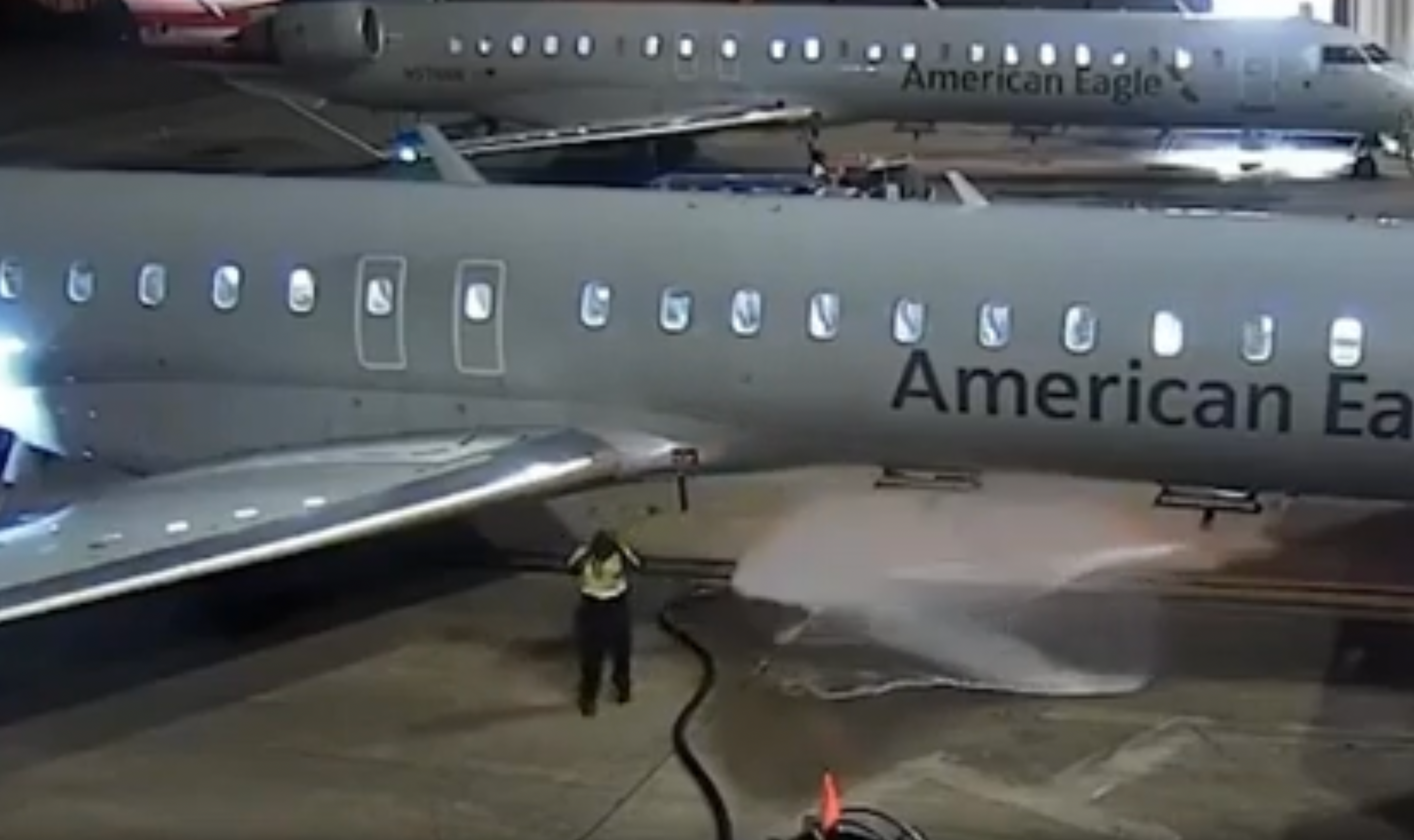 An airport worker lost control of a refueling hose, spraying gallons of flammable fuel on a plane over the weekend