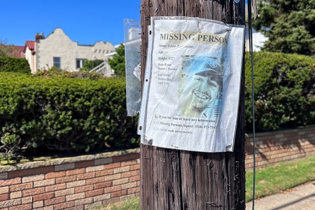<p>A missing person flyer for Petros Krommidas hangs on a telephone pole in Long Beach (AP Photo/Phillip Marcelo)</p>