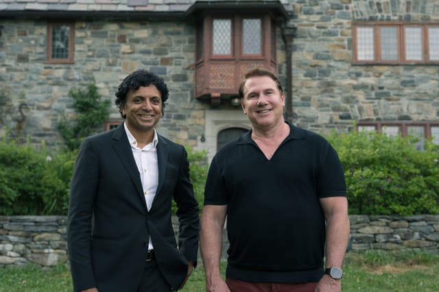 <p>Unlikely pairing: Filmmaker M Night Shyamalan and author Nicholas Sparks</p>
