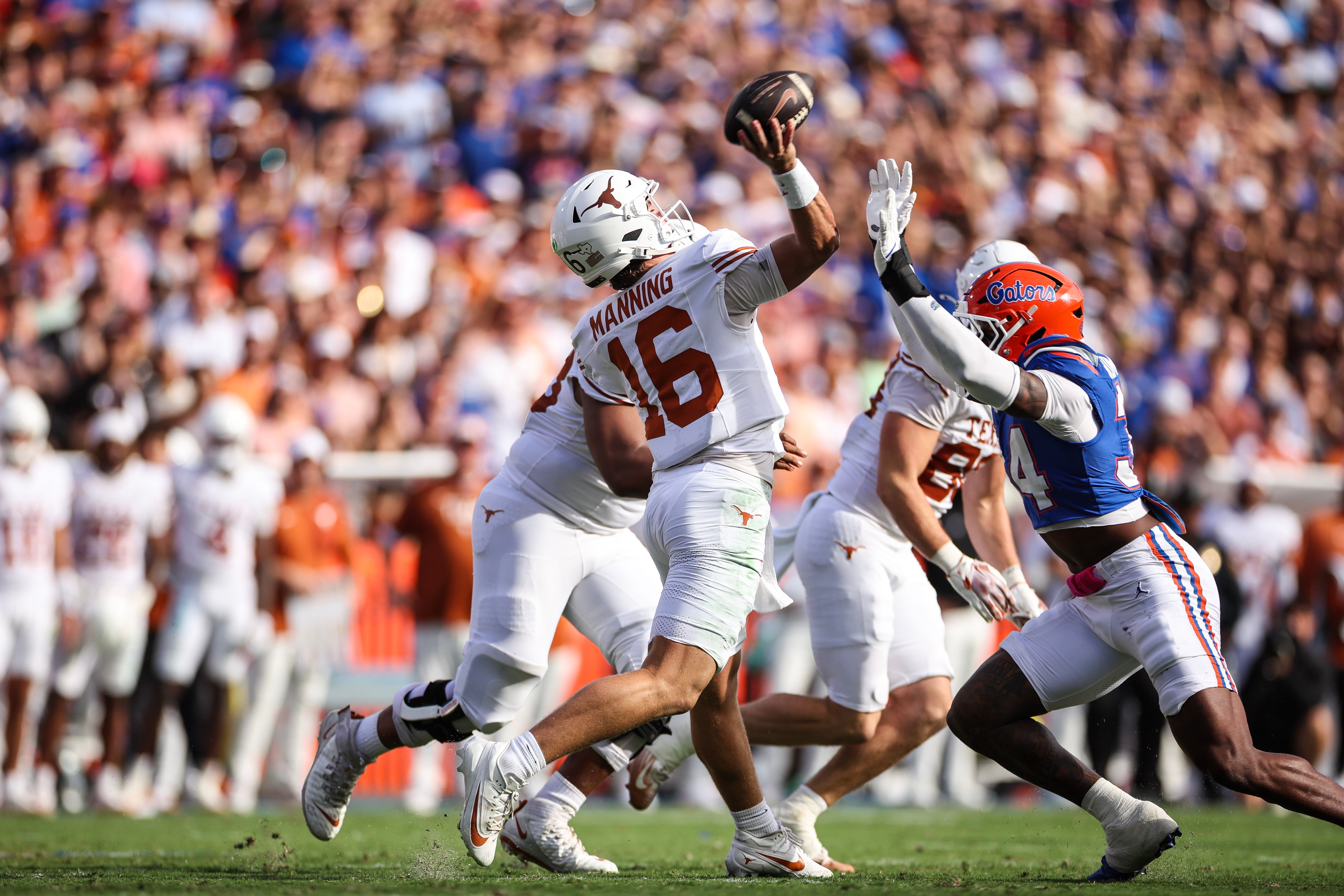 Four fans who rushed the field in Gainesville are expected to face felony charges under a new state law intended to prevent people from cross