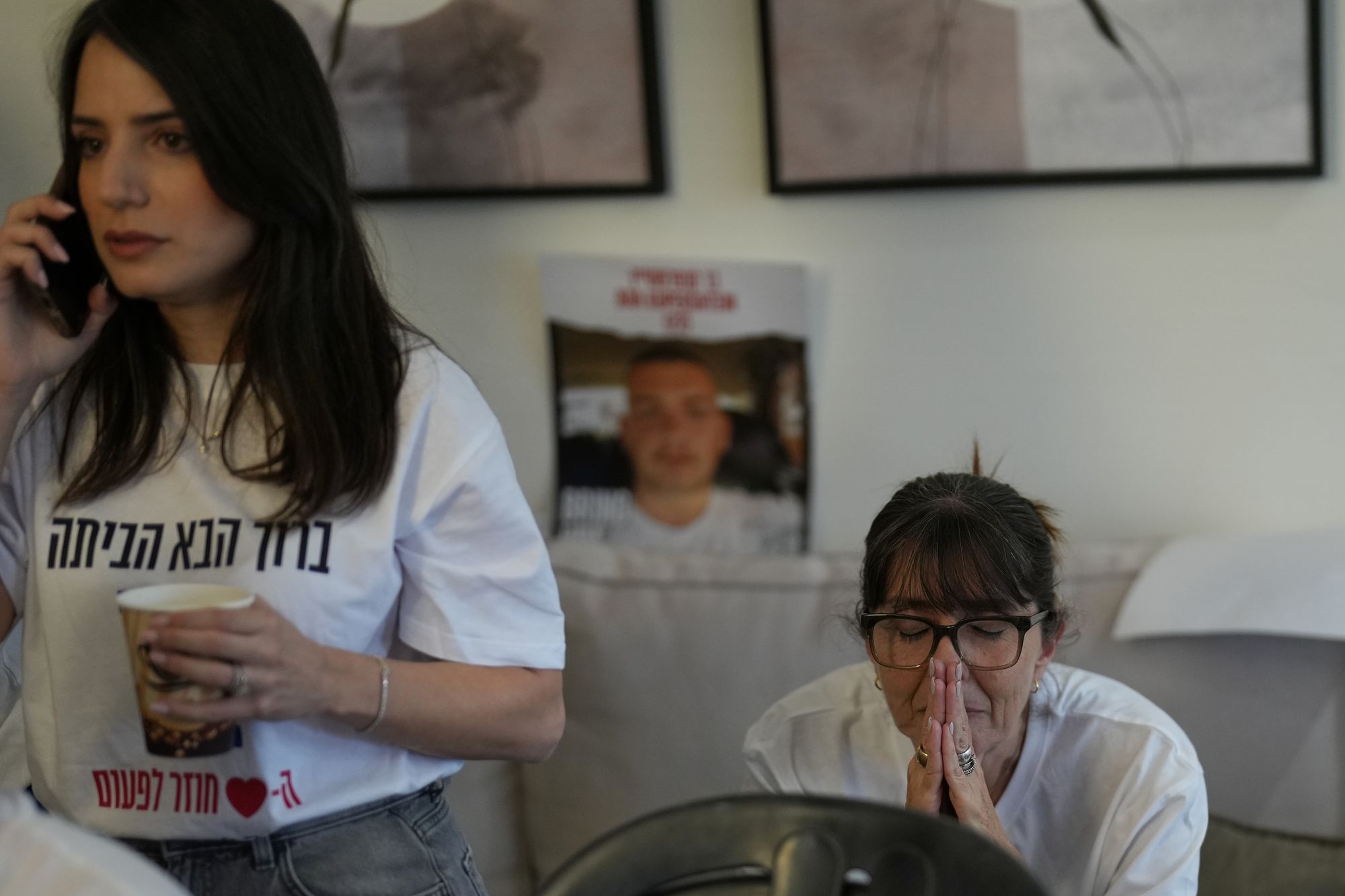Family and friends of Israeli hostage Bar Kuperstein react as they watch the live broadcast of hostages being released