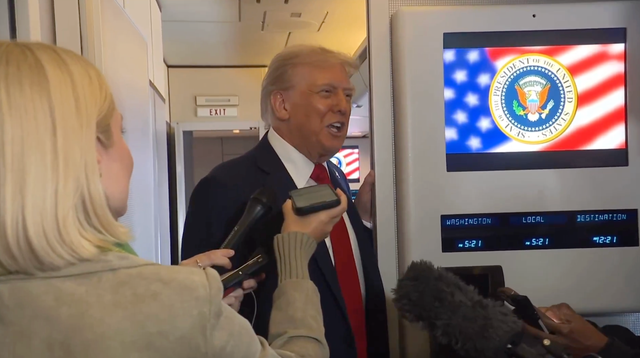 <p>President Donald Trump jokes with reporters about his chances of entering heaven aboard Air Force One on Sunday October 12 2025</p>