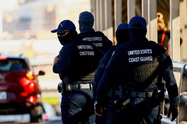 <p>U.S. Coast Guard officers work at the Paso del Norte International bridge. The U.S. Coast Guard new harassment police downgraded symbols like swastikas and nooses from hate symbols to ‘potentially divisive,’ though the military branch has issued a statement insisting the symbols are still prohibited despite the change</p>