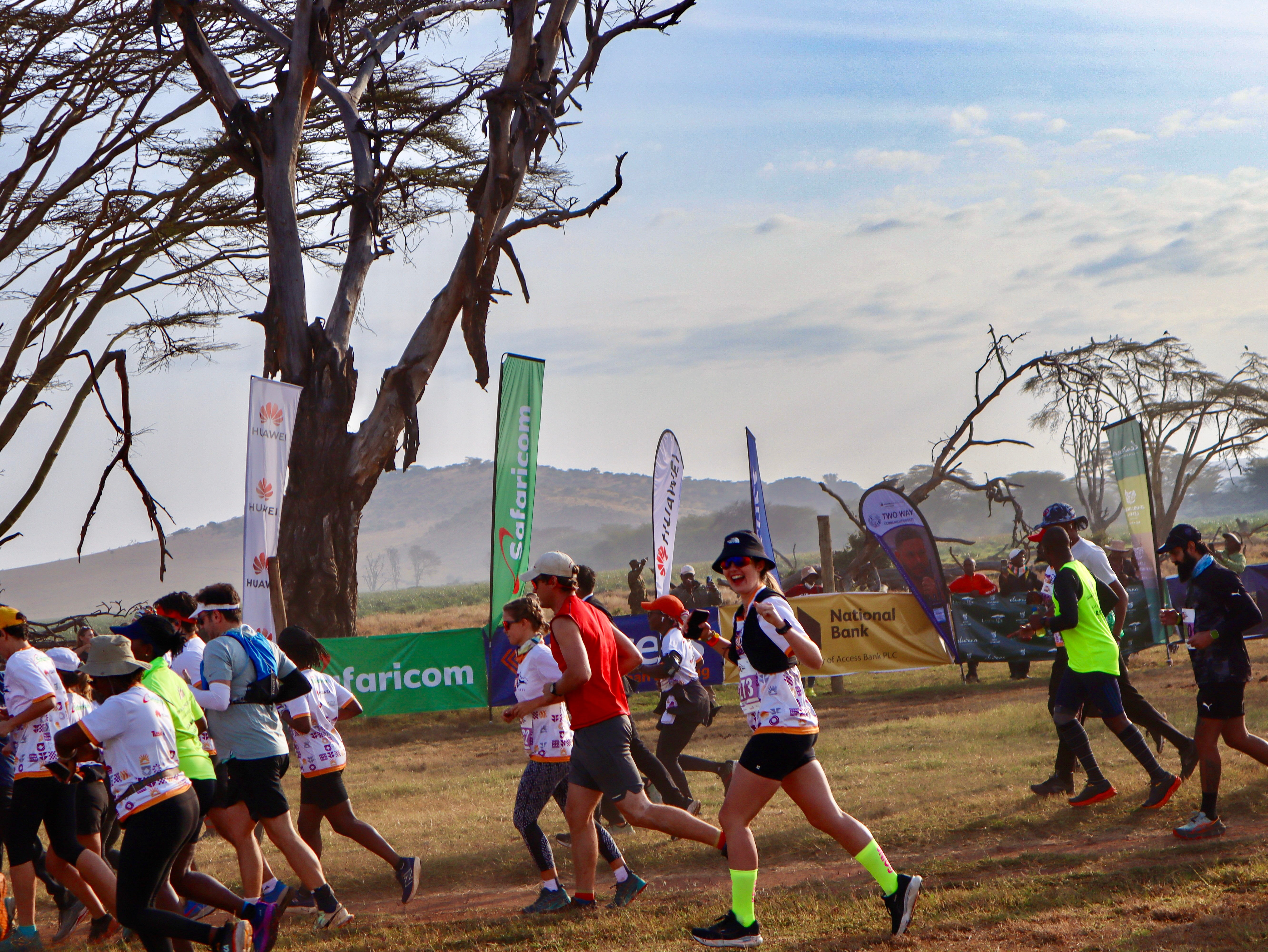Isabella crossing the start line in Kenya at the Lewa Safari Marathon