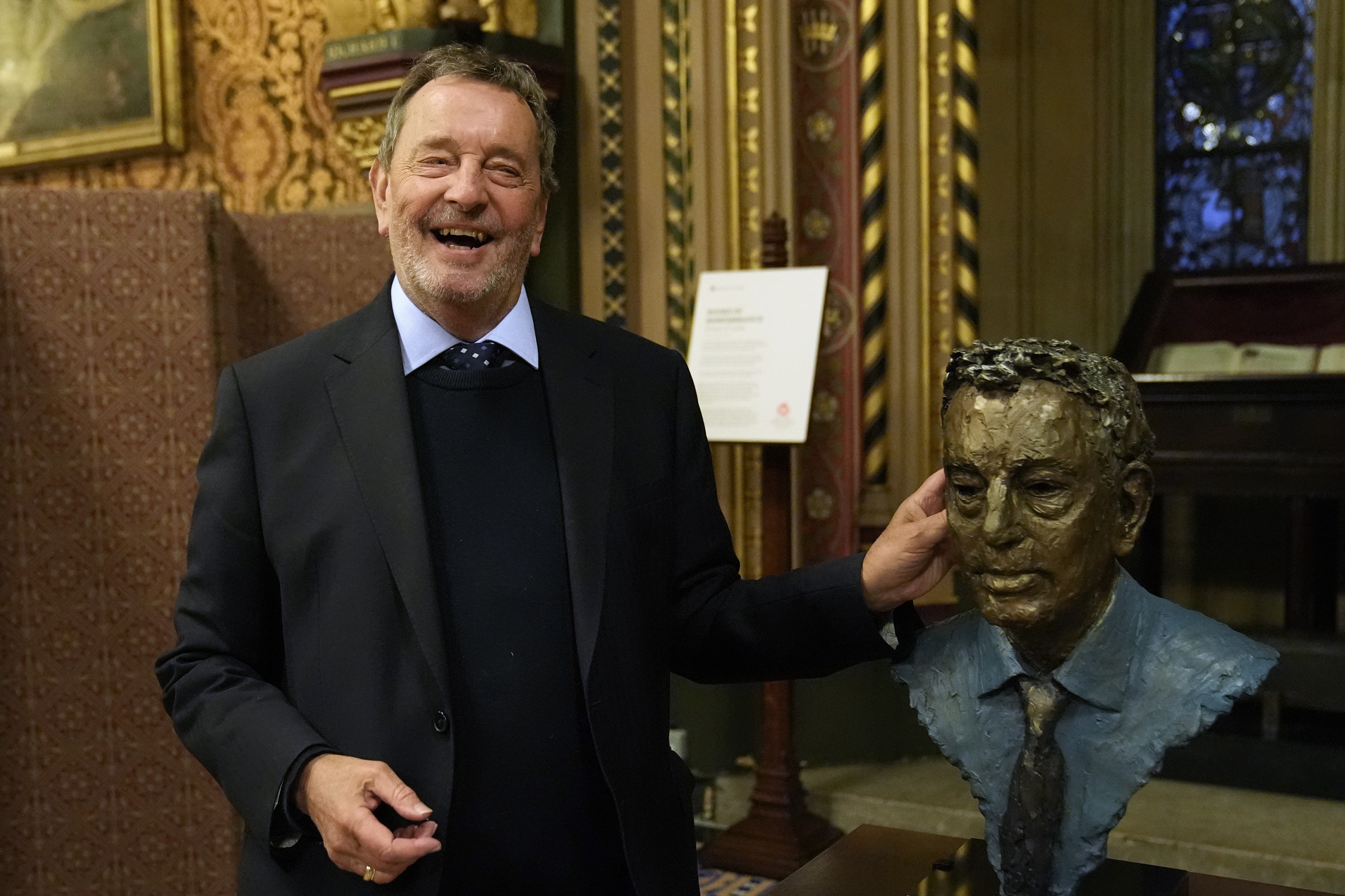 Lord David Blunkett with a bronze bust of himself (Stefan Rousseau/PA)