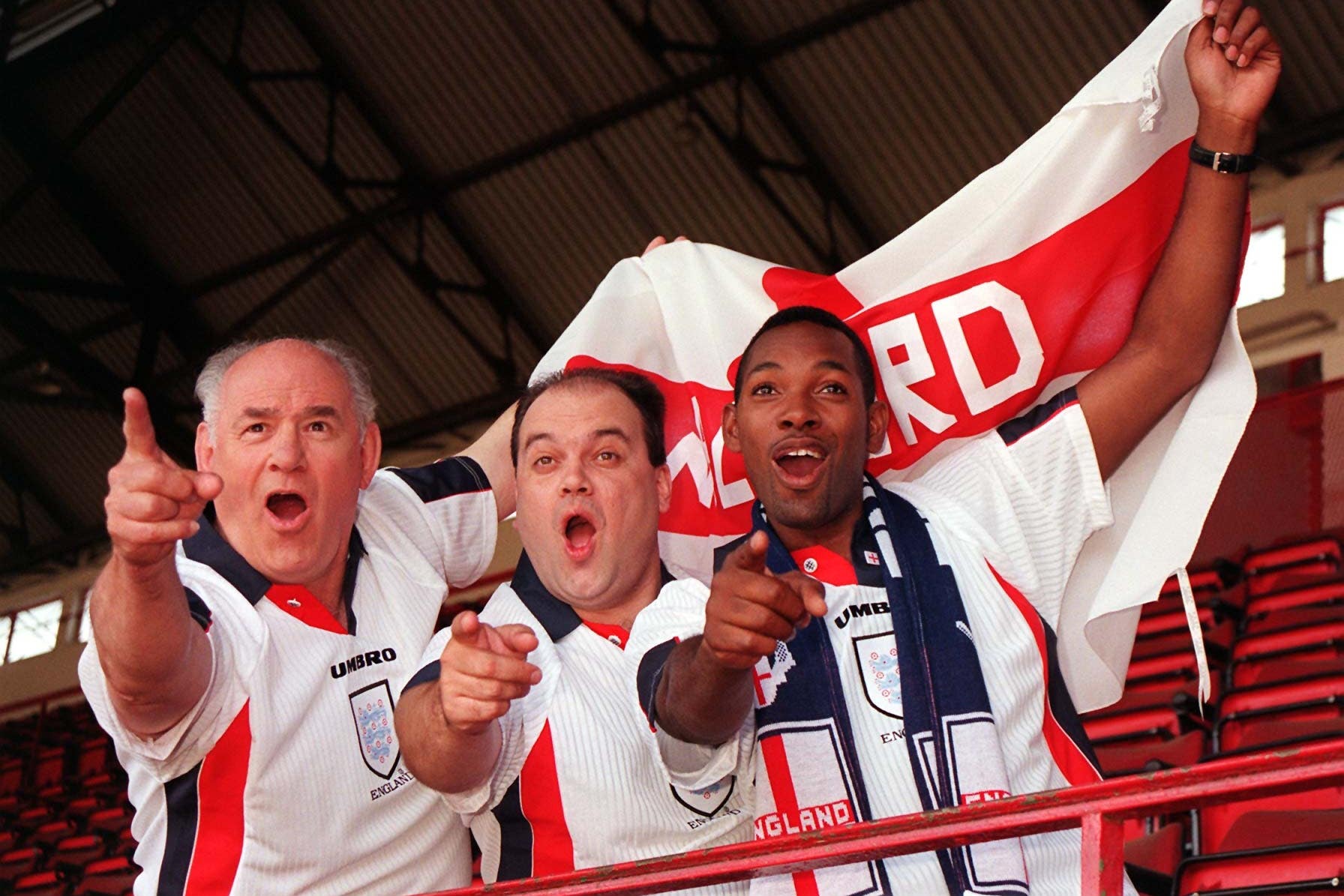 EastEnders actors Tony Caunter, Shaun Williamson and Des Coleman at Highbury in 1998 (Tony Harris/PA)