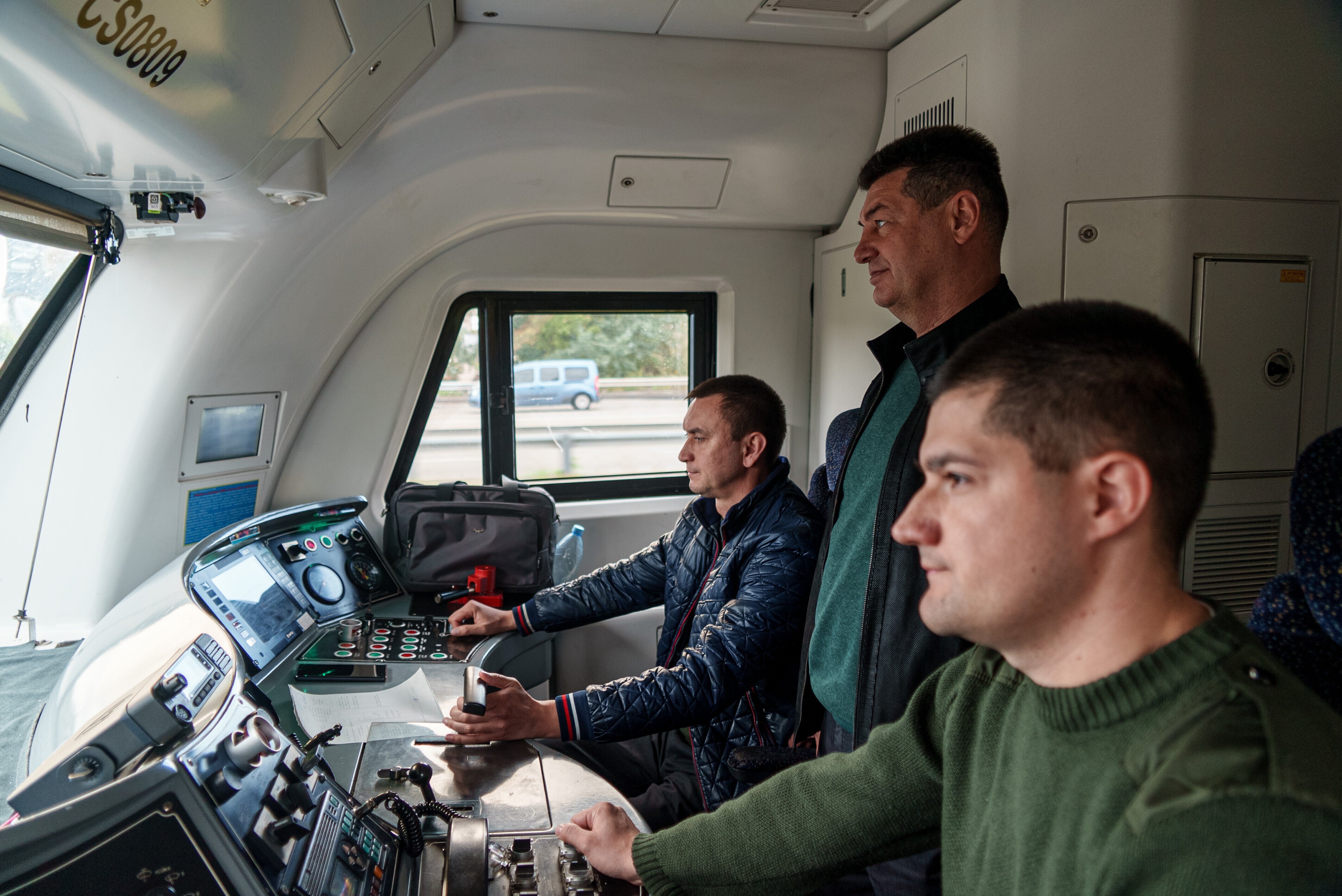 <p>Oleh Pryshchepa, 54, second right, a train driver, rides at the train driver's cabin in Kyiv, Ukraine, Friday, Oct. 3, 2025. (AP Photo/Vasilisa Stepanenko)</p>