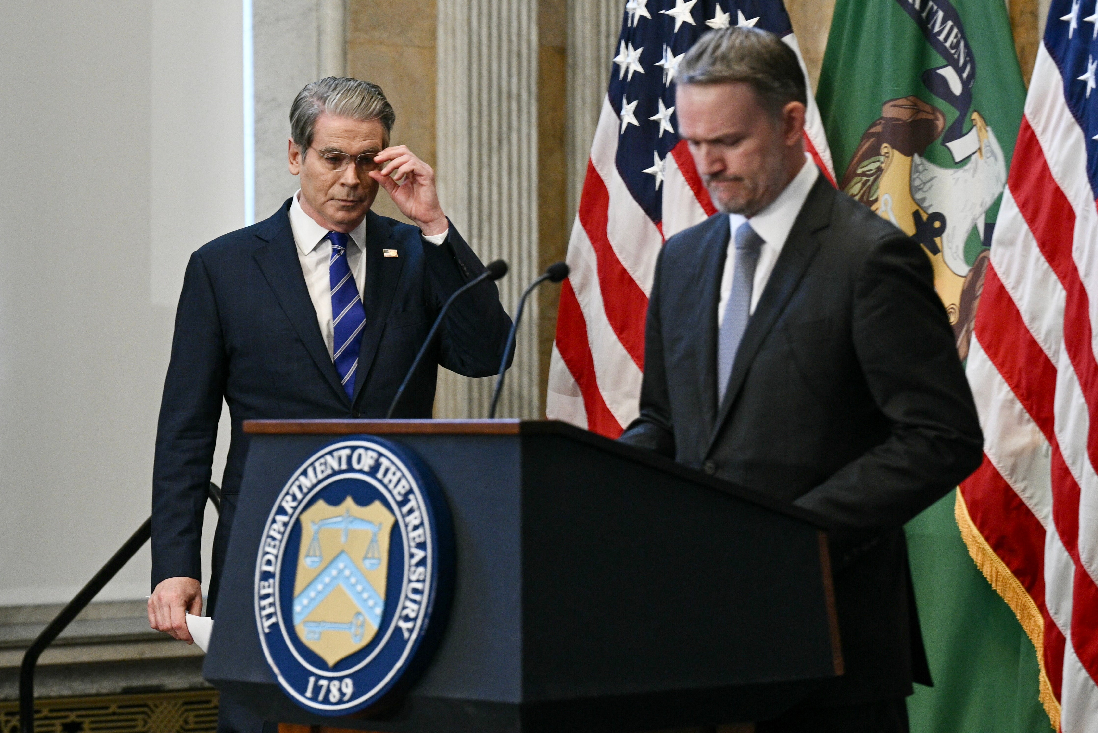 <p>US treasury secretary Scott Bessent (L) looks on as US trade representative Jamieson Greer delivers remarks on ‘Game Plan for US Investment’ on the sidelines of the IMF/World Bank annual meetings at CNBC Invest in America Forum, in Washington, DC on 15 October 2025</p>