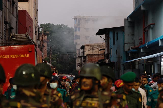 <p>Smoke rises from the building in Dhaka, Bangladesh</p>