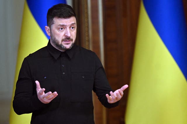 <p>Ukraine's president Volodymyr Zelensky reacts during a press conference</p>