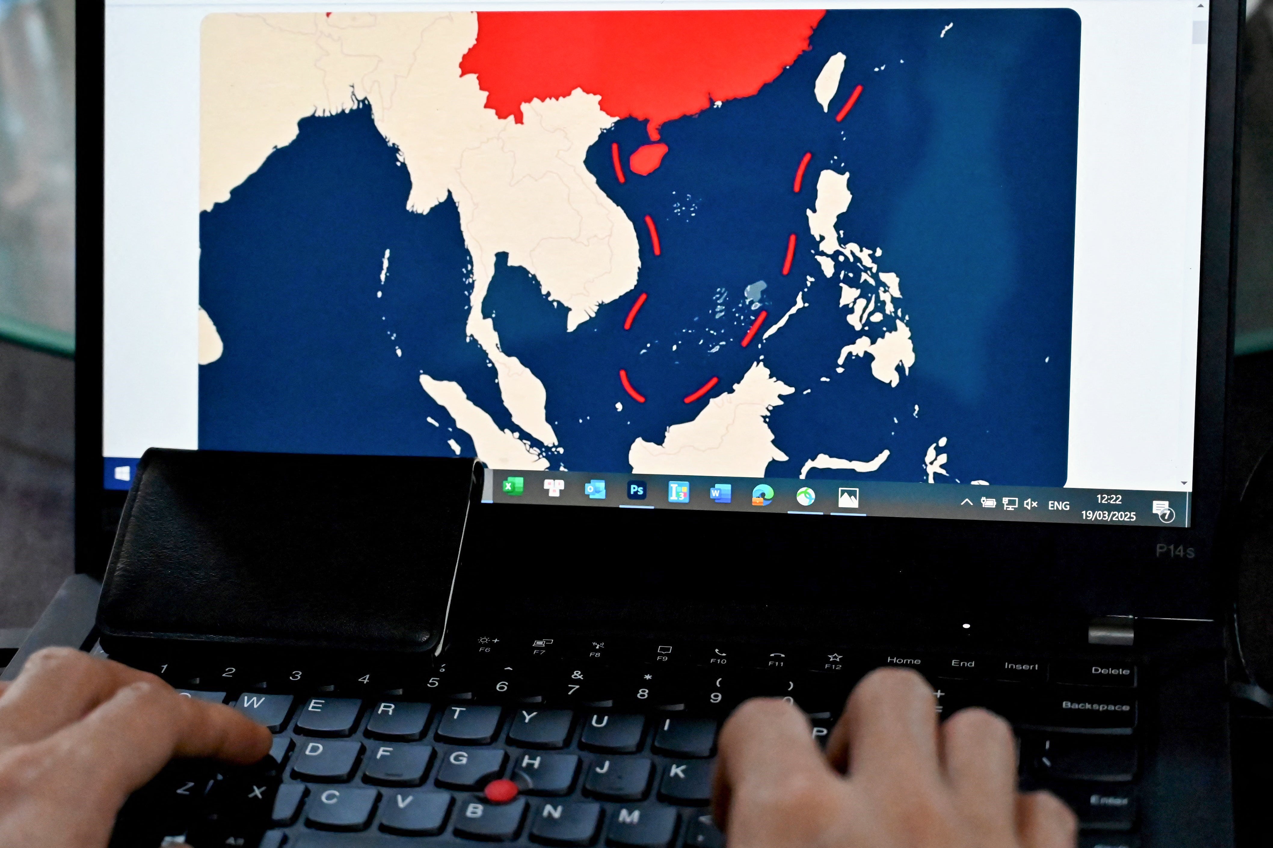 <p>This illustration taken on 19 March 2025 shows the nine-dash line on a map of a disputed area of the South China Sea on a laptop in Lao Cai province</p>