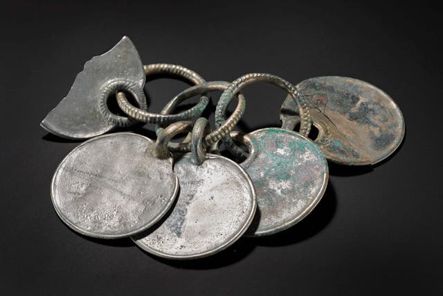 <p>The silver colour on objects in the Peebles Hoard is due to high levels of tin (National Museums Scotland/PA)</p>