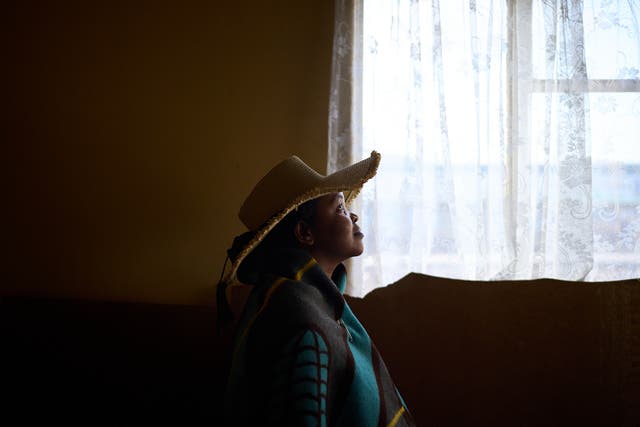 <p>Evelin Kholeli, a massage therapist who is HIV-negative and lost access to the prevention medication known as PreP, poses for a portrait in Maputsoe, Lesotho.</p>