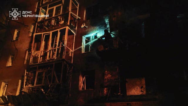 <p>A firefighter works at the site of an apartment building hit during a Russian drone strike, amid Russia's attack on Ukraine, in the town of Nizhyn, Chernihiv region Ukraine</p>