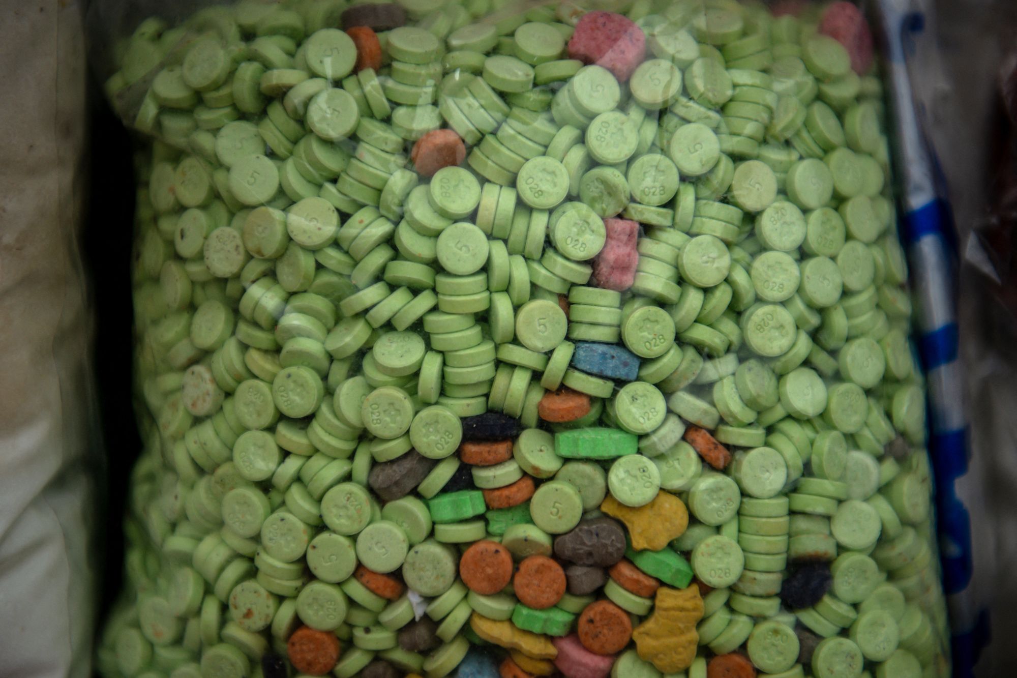 <p>Packs of pills of ketamine are displayed before being set on fire during a destruction ceremony to mark the United Nations' International Day against Drug Abuse and Illicit Trafficking in Yangon on 26 June 2025</p>