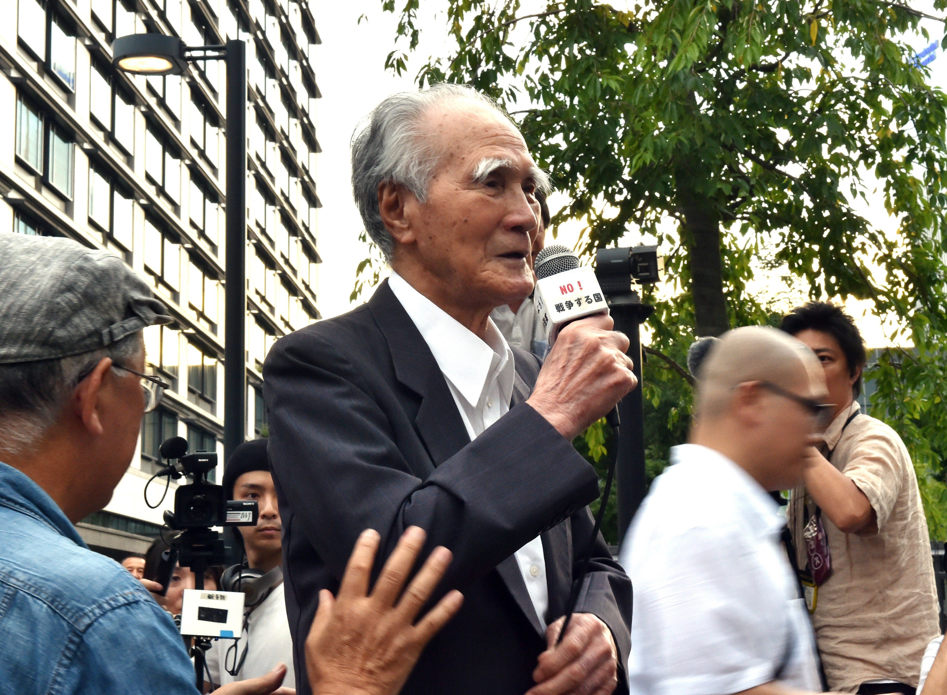 File: Former Japanese prime minister Tomiichi Murayama delivers a speech before civic group members during an anti-government rally outside the National Diet in Tokyo on 23 July 2015
