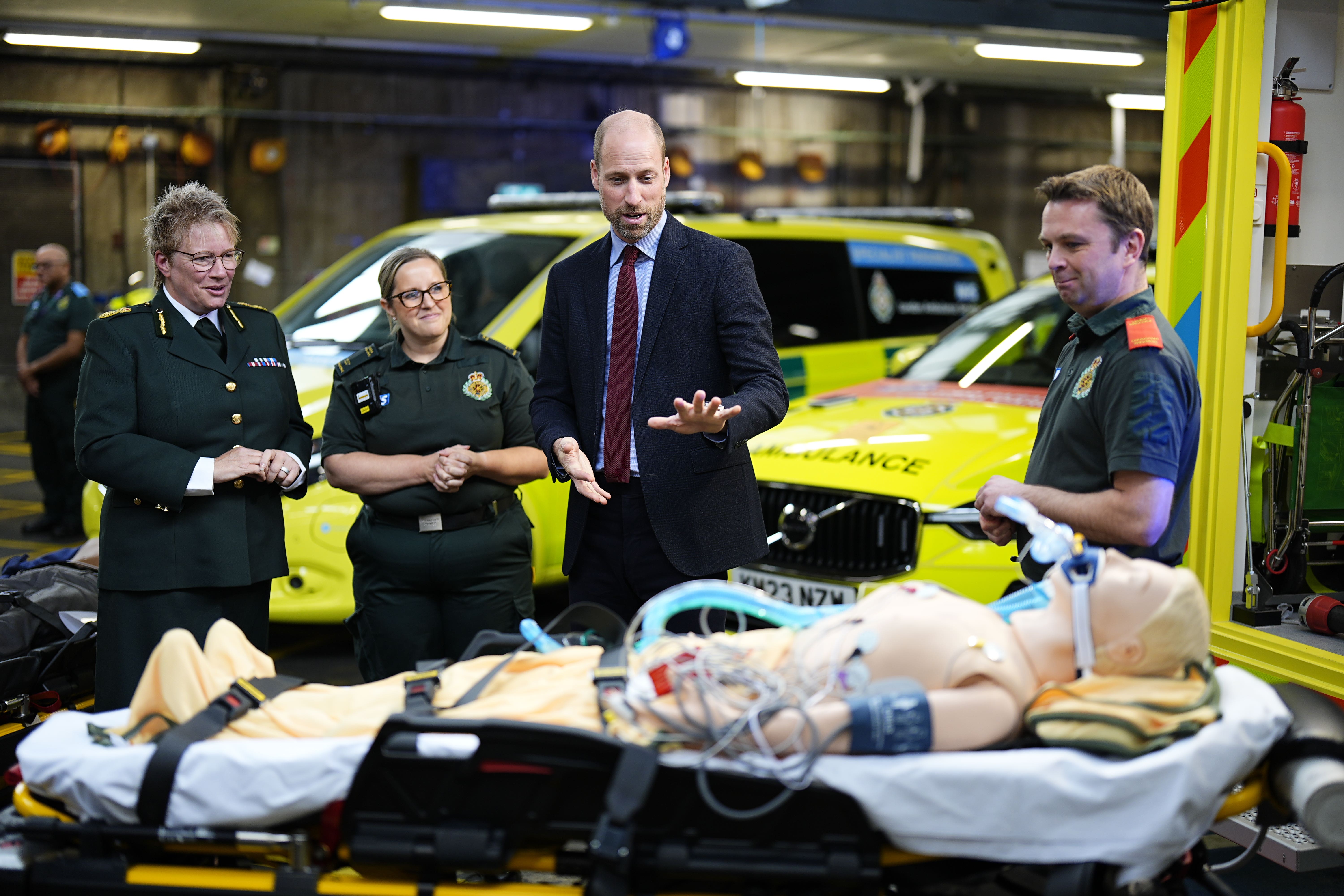 The Prince of Wales takes part in a training demonstration during a visit to the London Ambulance Service at its headquarters in Waterloo (Aaron Chown/PA)
