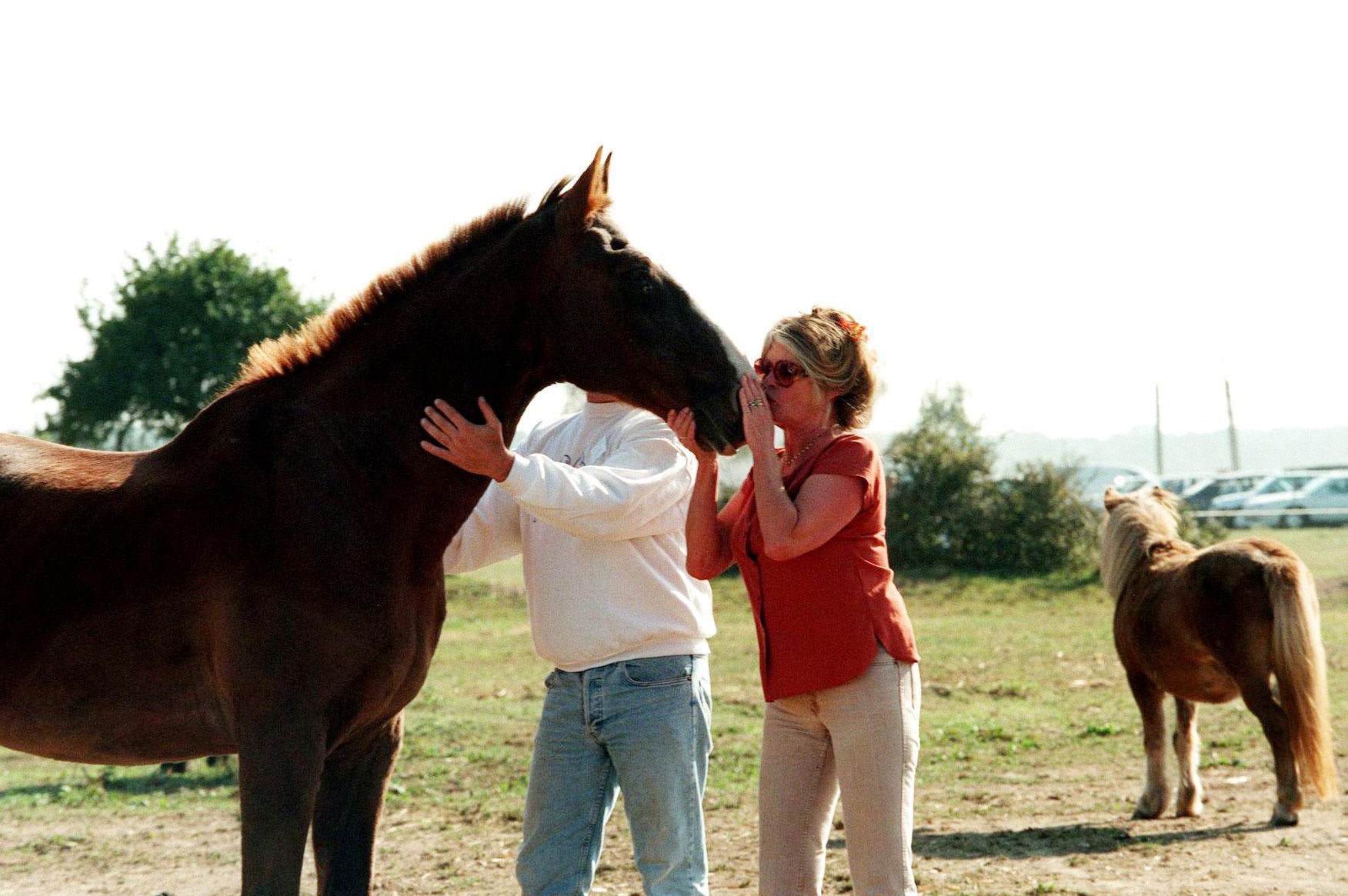 Bardot with her fourth husband Bernard d’Ormale at her foundation for animals in Saint Aubin, in 1997