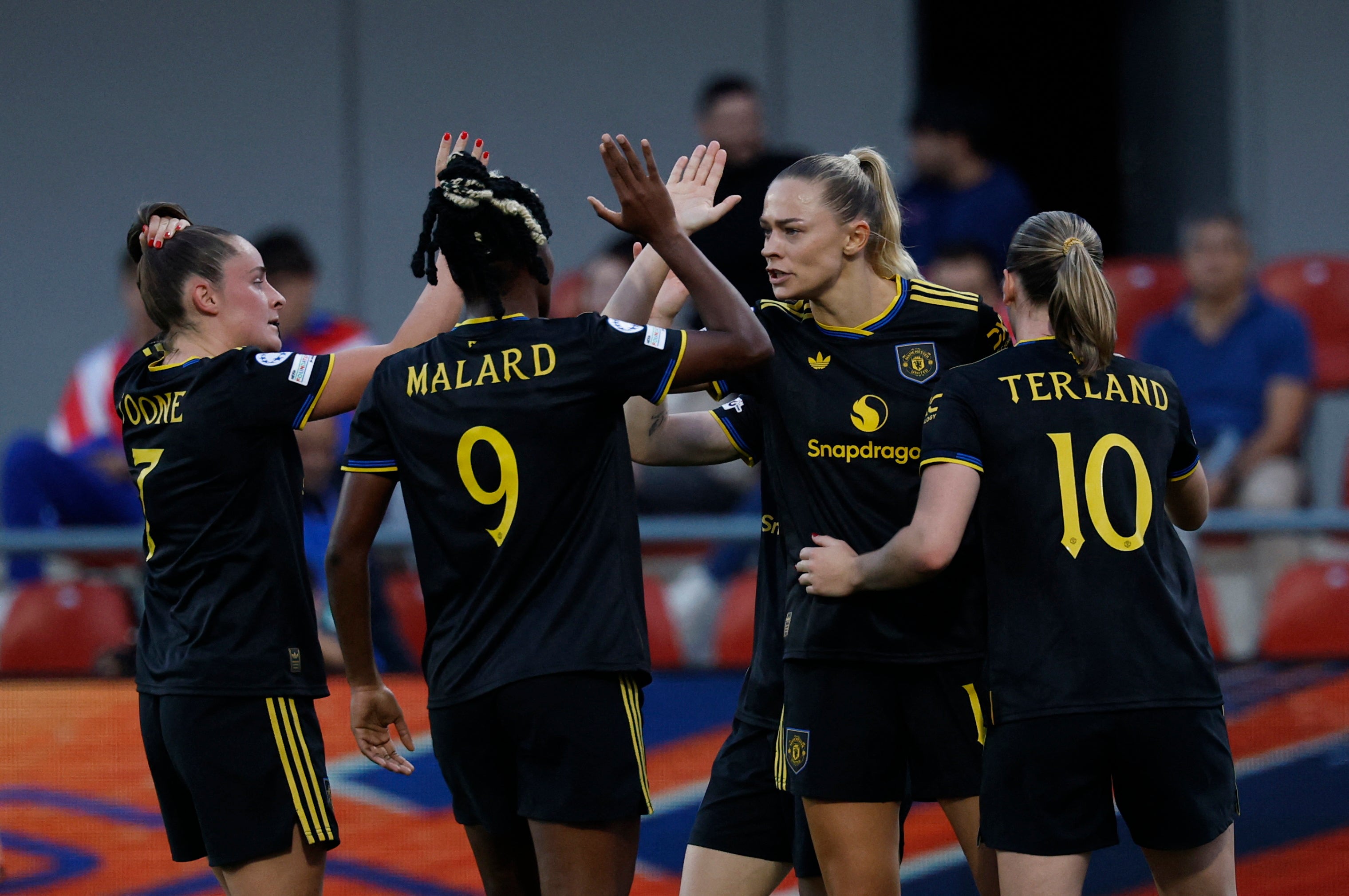 <p>Manchester United's Fridolina Rolfo celebrates scoring their first goal with teammates </p>
