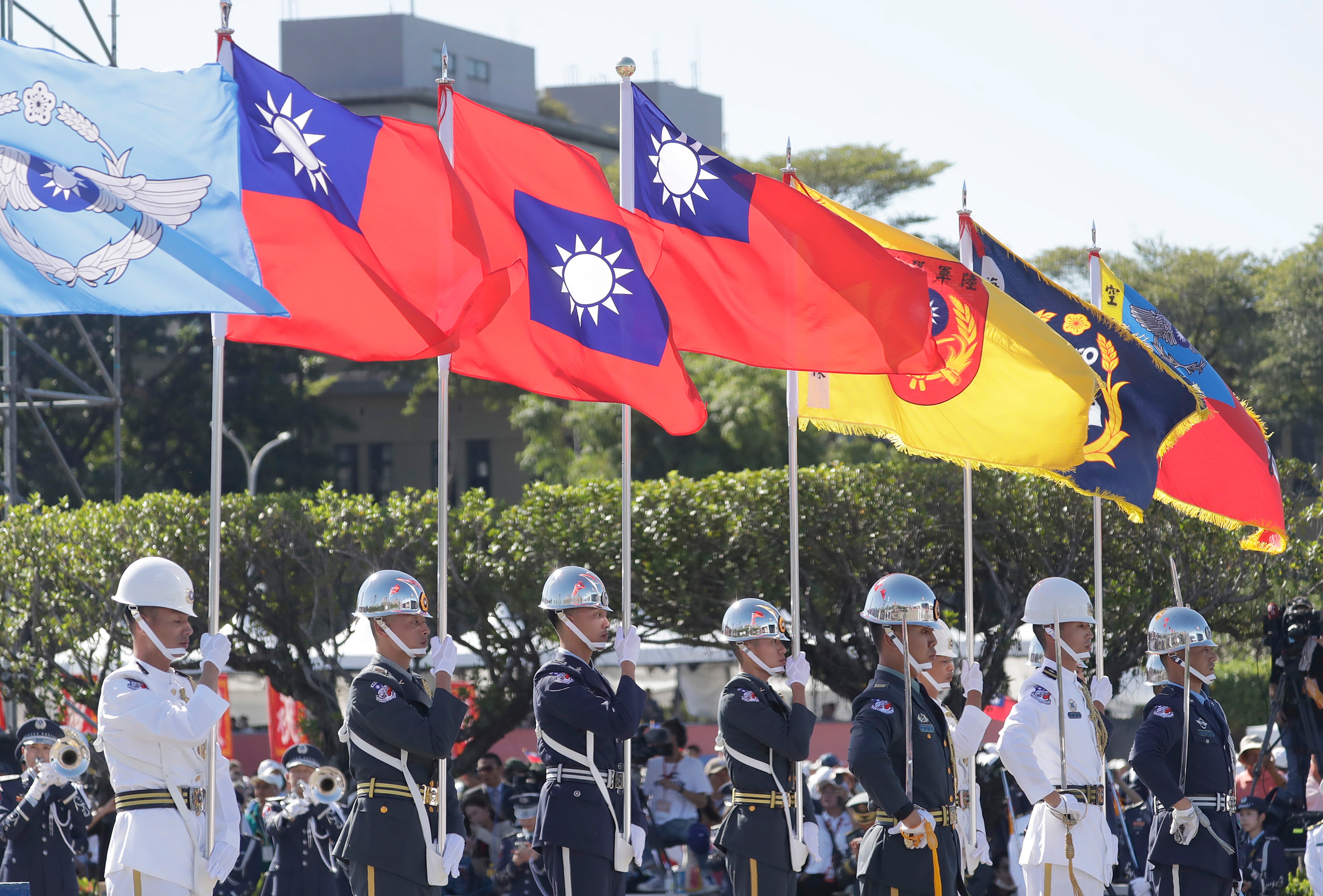 <p>Members of an honour guard attend during National Day celebrations in front of the Presidential Building in Taipei, Taiwan, Friday, 10 October 2025</p>