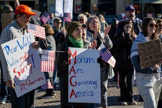 People take part in a No Kings protest, in MalmÃ¶, Sweden, Saturday, Oct. 18, 2025. (Johan Nilsson/TT News Agency via AP)
