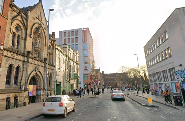 <p>The 20-year-old woman was found dead at an apartment on Grosvenor Street, Manchester (pictured)</p>