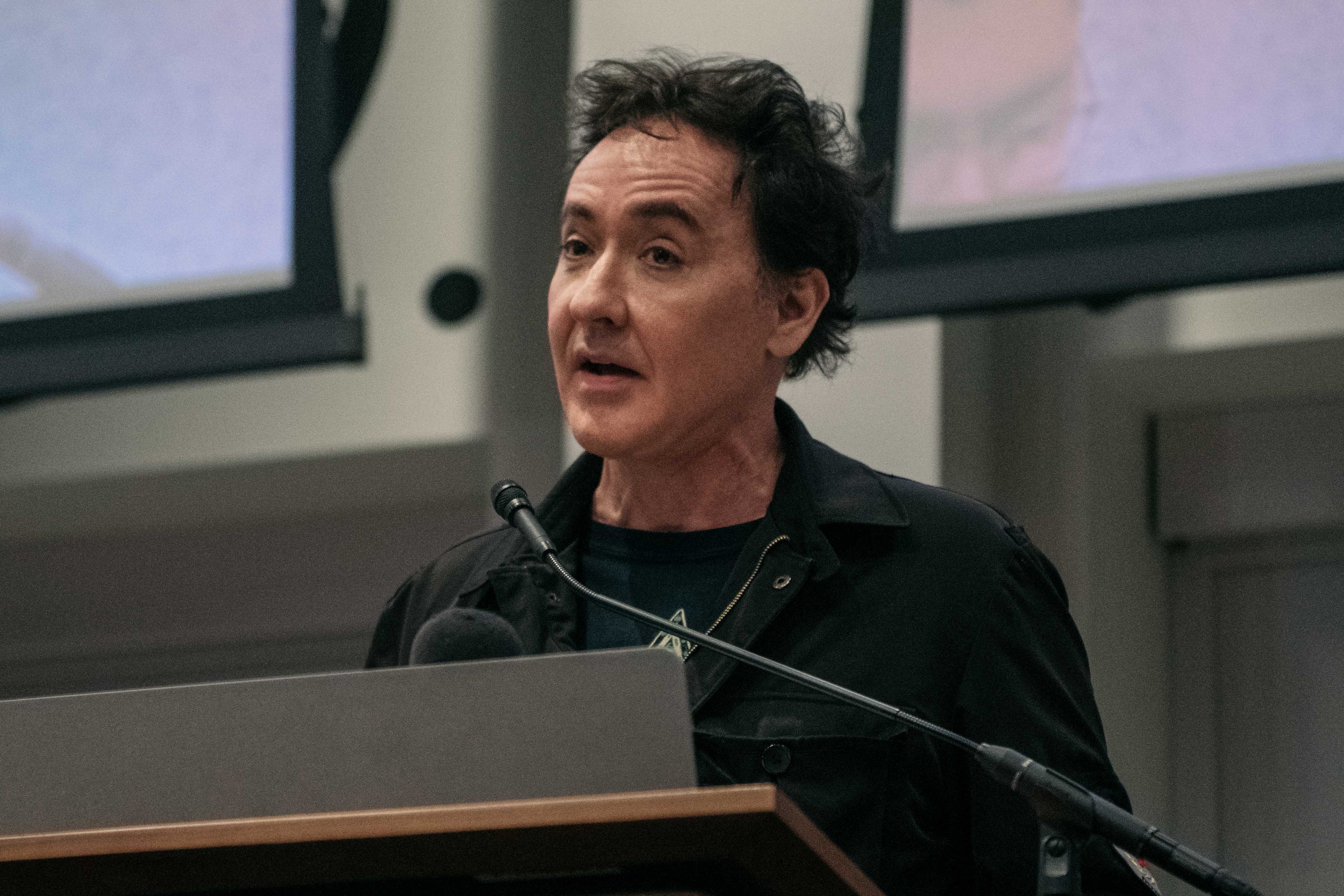 John Cusack speaking at a rally for teachers in Chicago in September 2019