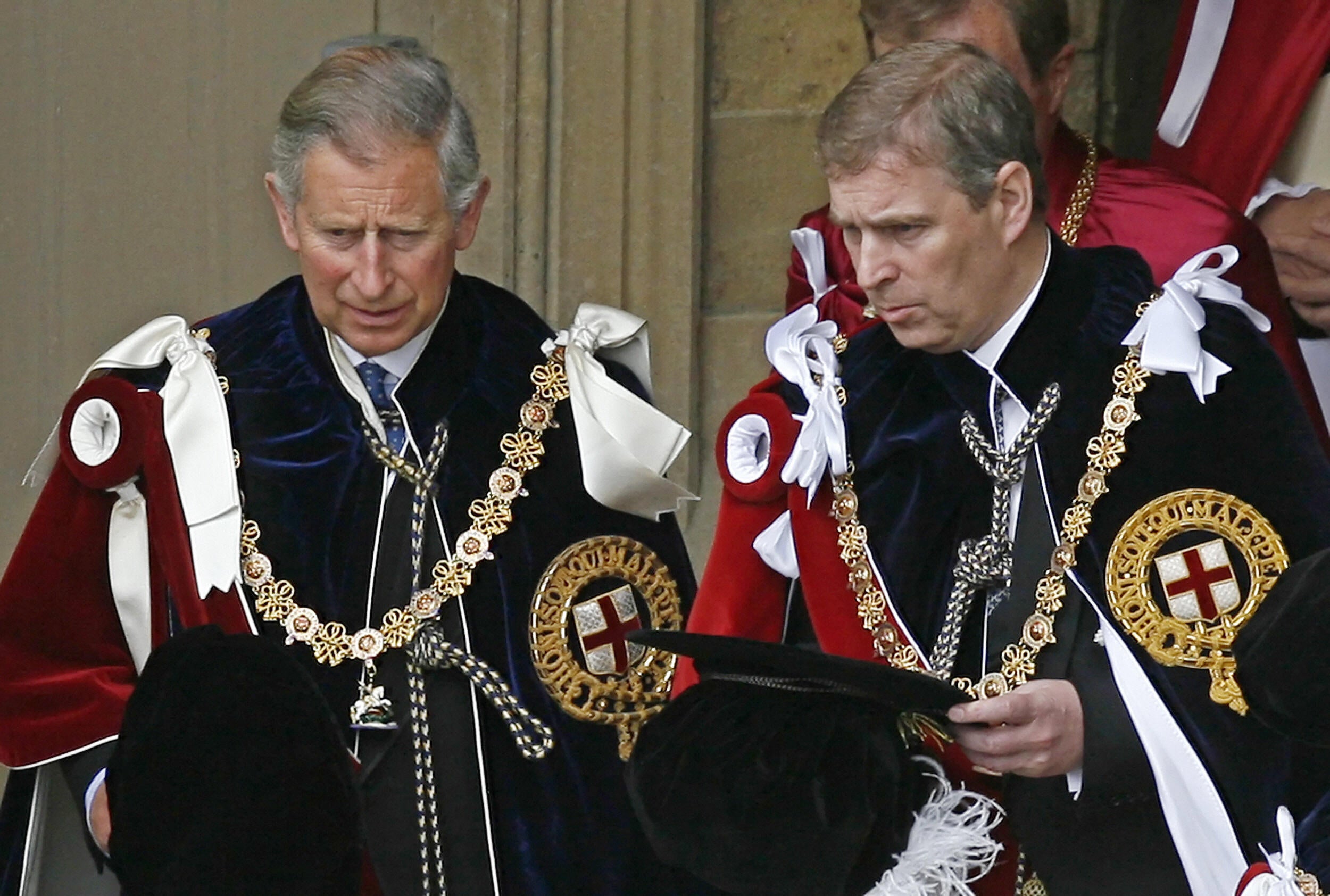 Prince Charles (L) and Prince Andrew depart after attending the Garter service at St George's Chapel at Windsor Castle, in Windsor, in south-east England, 18 June 2007. Andrew has now given up his title of Knight of the Garter.