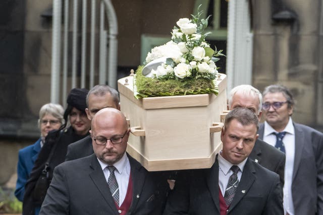 <p>The coffin carrying former cricket umpire Dickie Bird is carried from St Mary’s Church, Barnsley, following his funeral service</p>