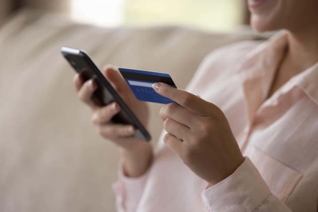 Nearly a fifth of UK-listed firms alerting over profits have flagged the impact of weak consumer confidence, research shows (Alamy/PA)