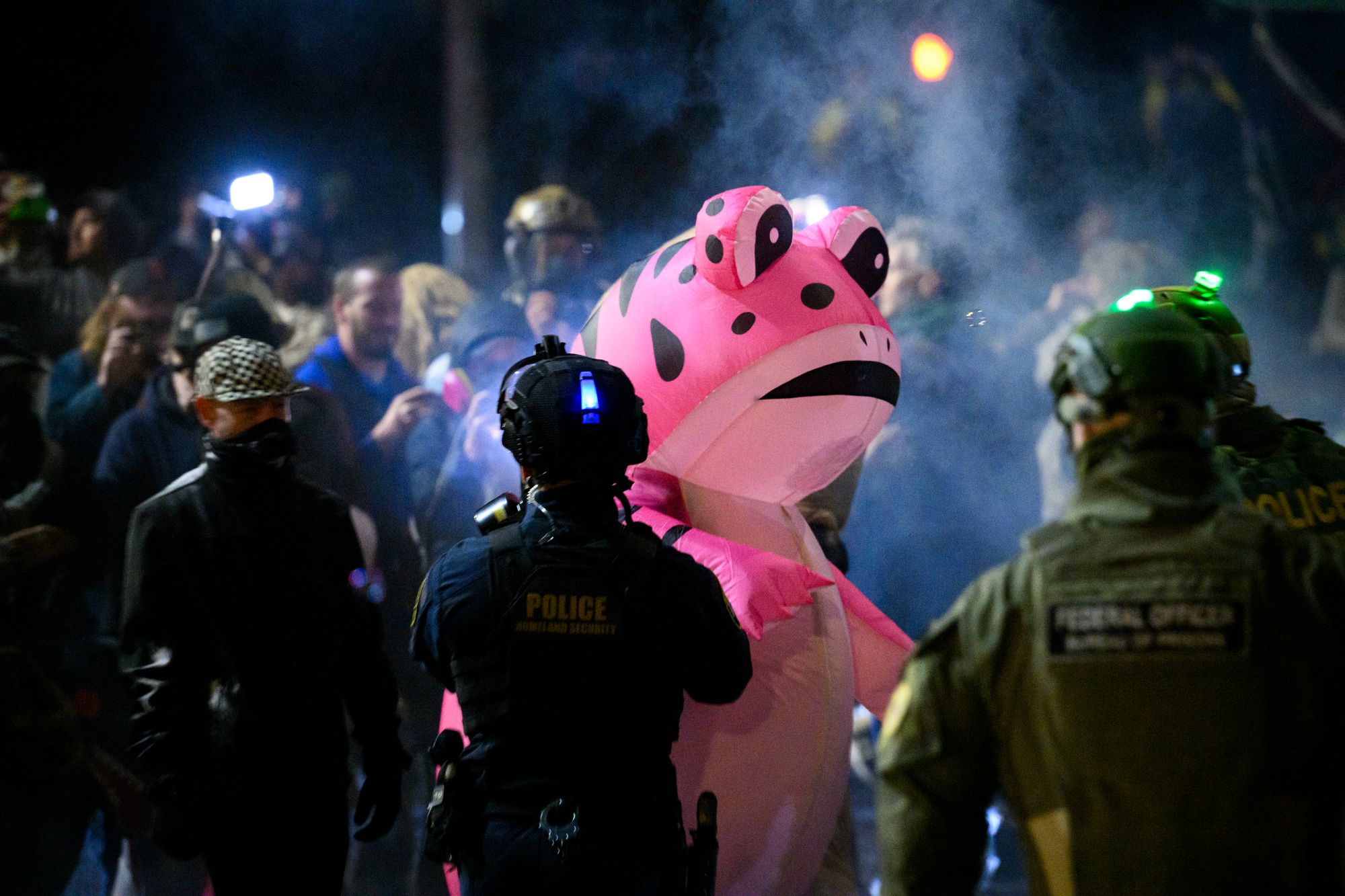 Anti-ICE protesters clash with federal agents outside an ICE facility in Portland on Oct. 18