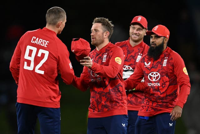 <p>England's players celebrate their T20i win over New Zealand</p>