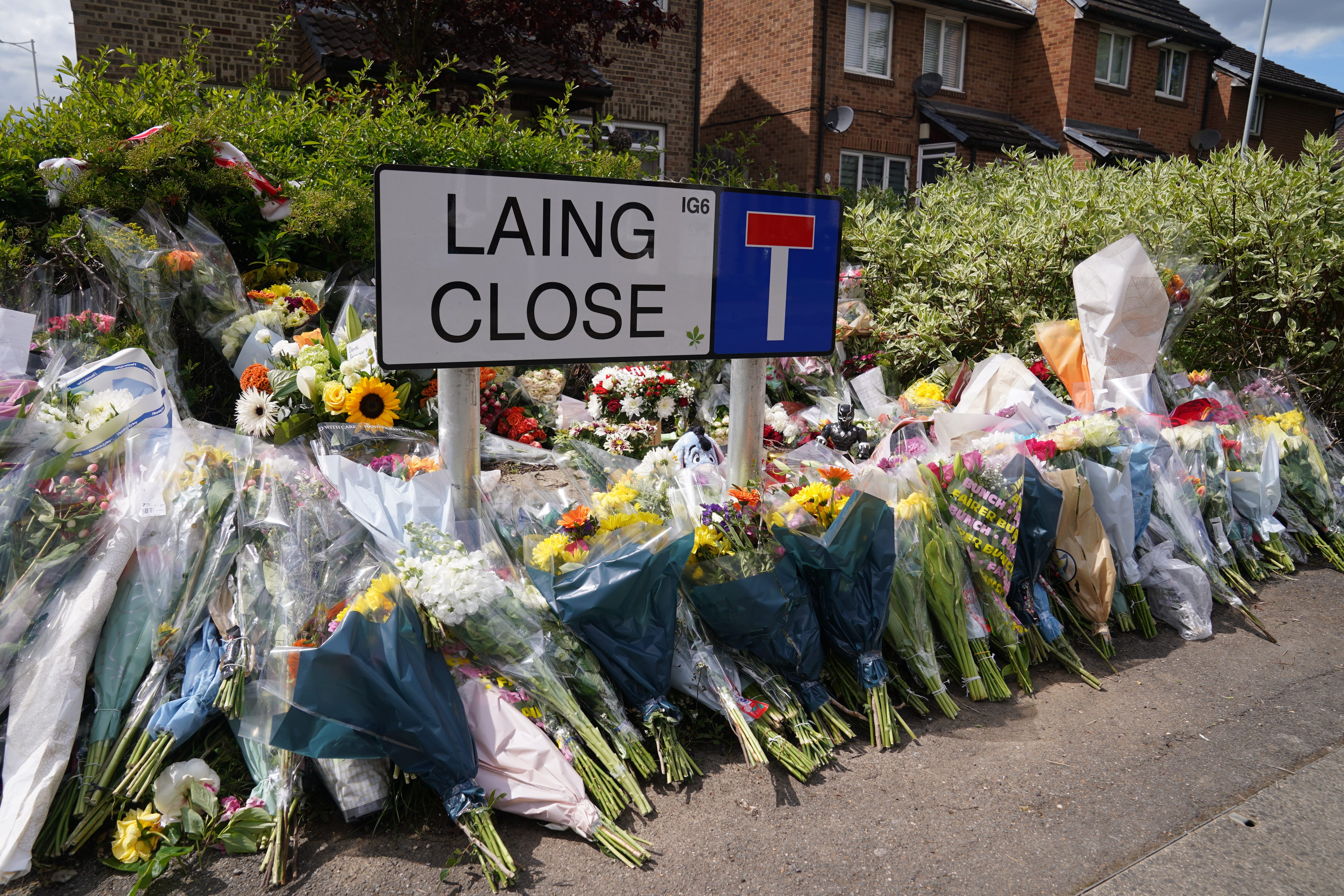 Floral tributes were left close to the scene in Hainault, east London (Lucy North/PA)