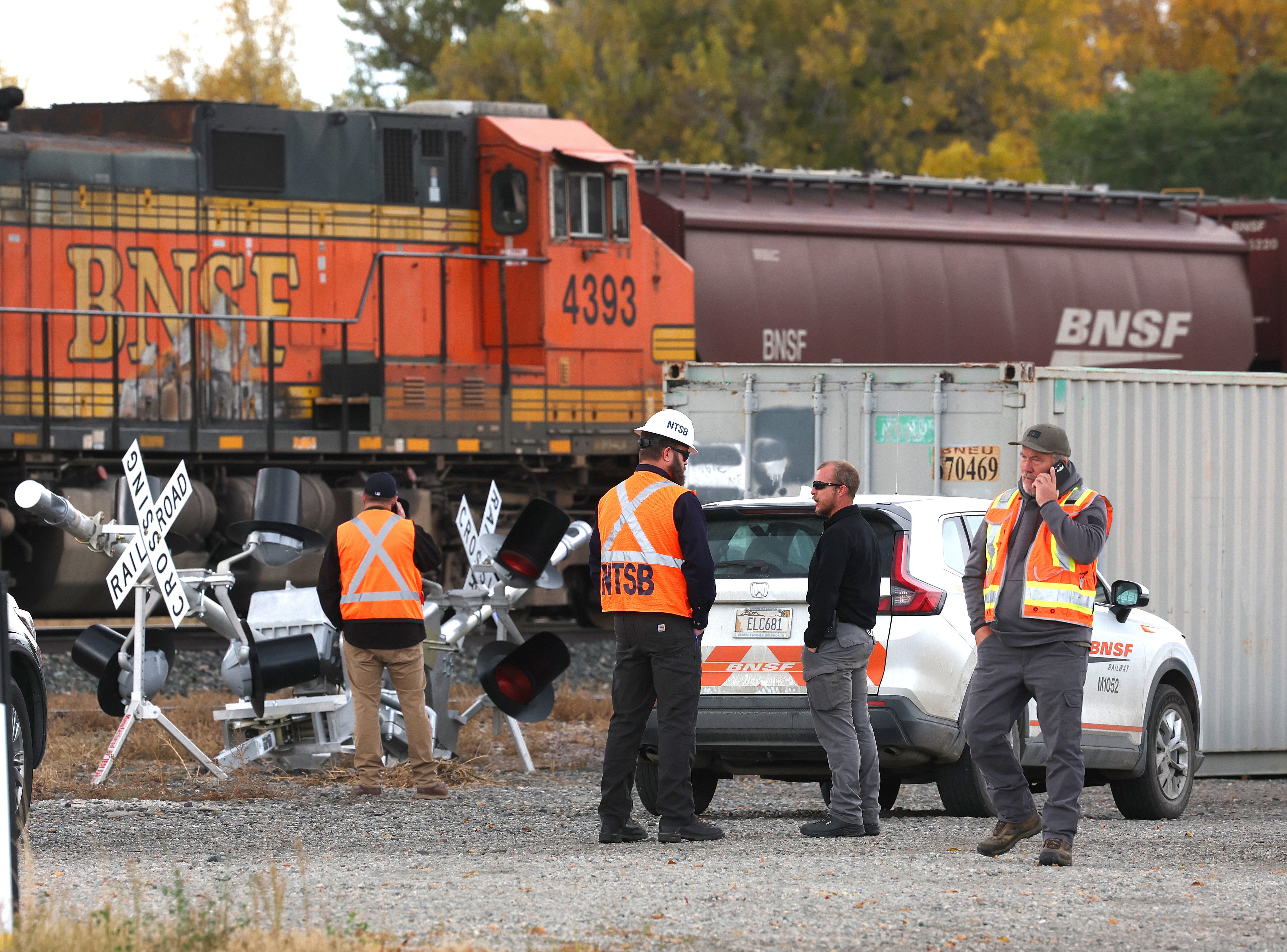 Investigators from the National Transportation Safety Board, Columbus police and Stillwater County Sheriff deputies are on the scene of an train-related accident Sunday, Oct. 19, 2025, in Columbus, MT