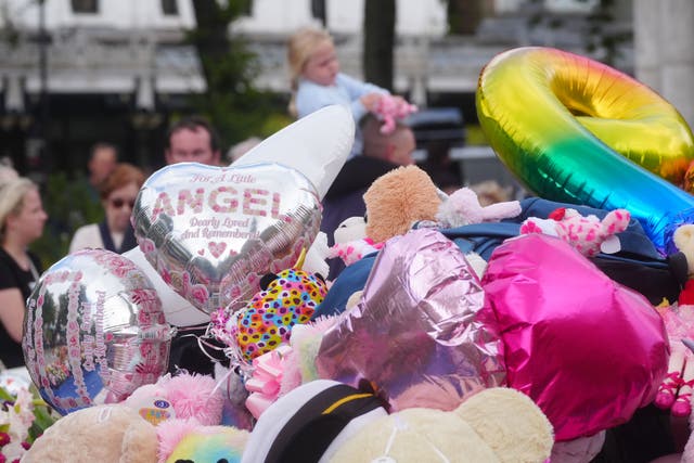 <p>Flowers and tributes outside the Atkinson Art Centre in Southport, following the 2024 attack </p>