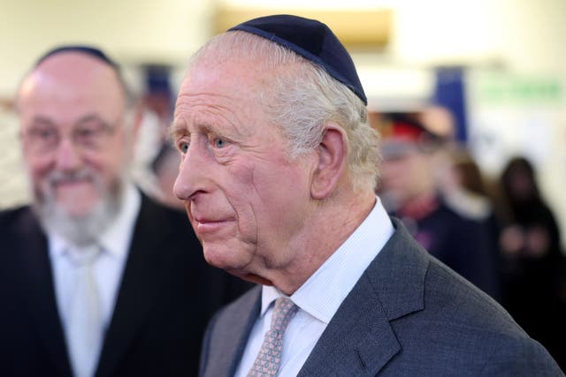 Charles wore a kippah during his visit to Heaton Park Hebrew Congregation Synagogue in Manchester, to meet members of the community, including some of those who were present during the October 2nd attack (Chris Jackson/PA)