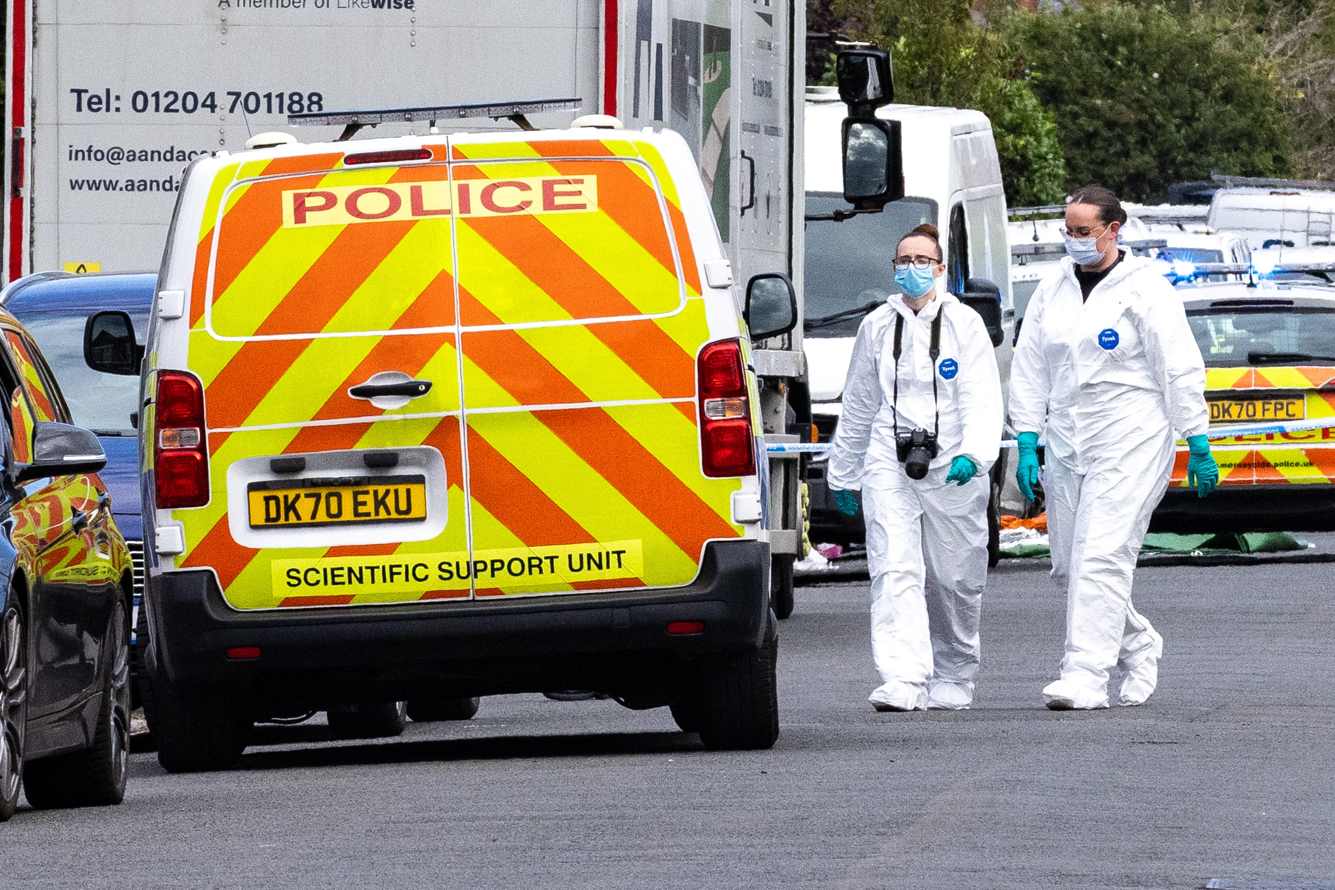 Forensic officers on Hart Street in Southport, Merseyside (James Speakman/PA)