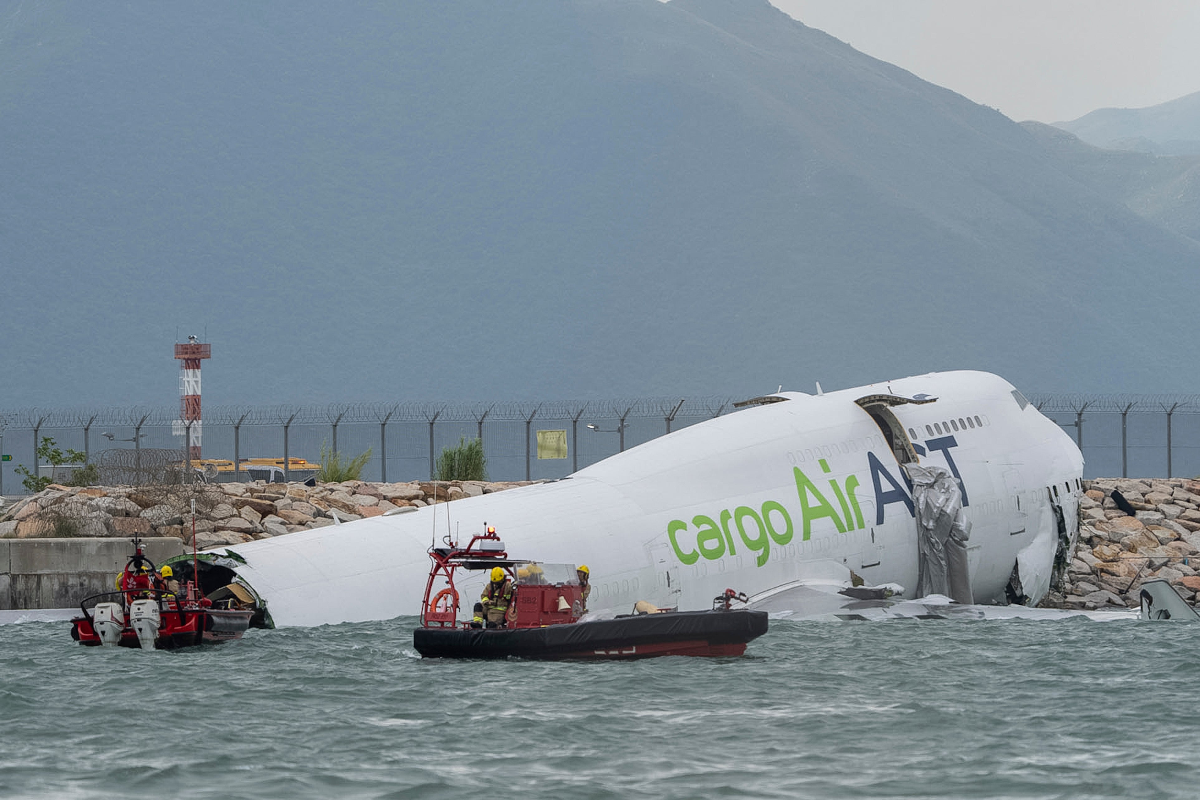 Two dead as Hong Kong cargo plane splits in half after…