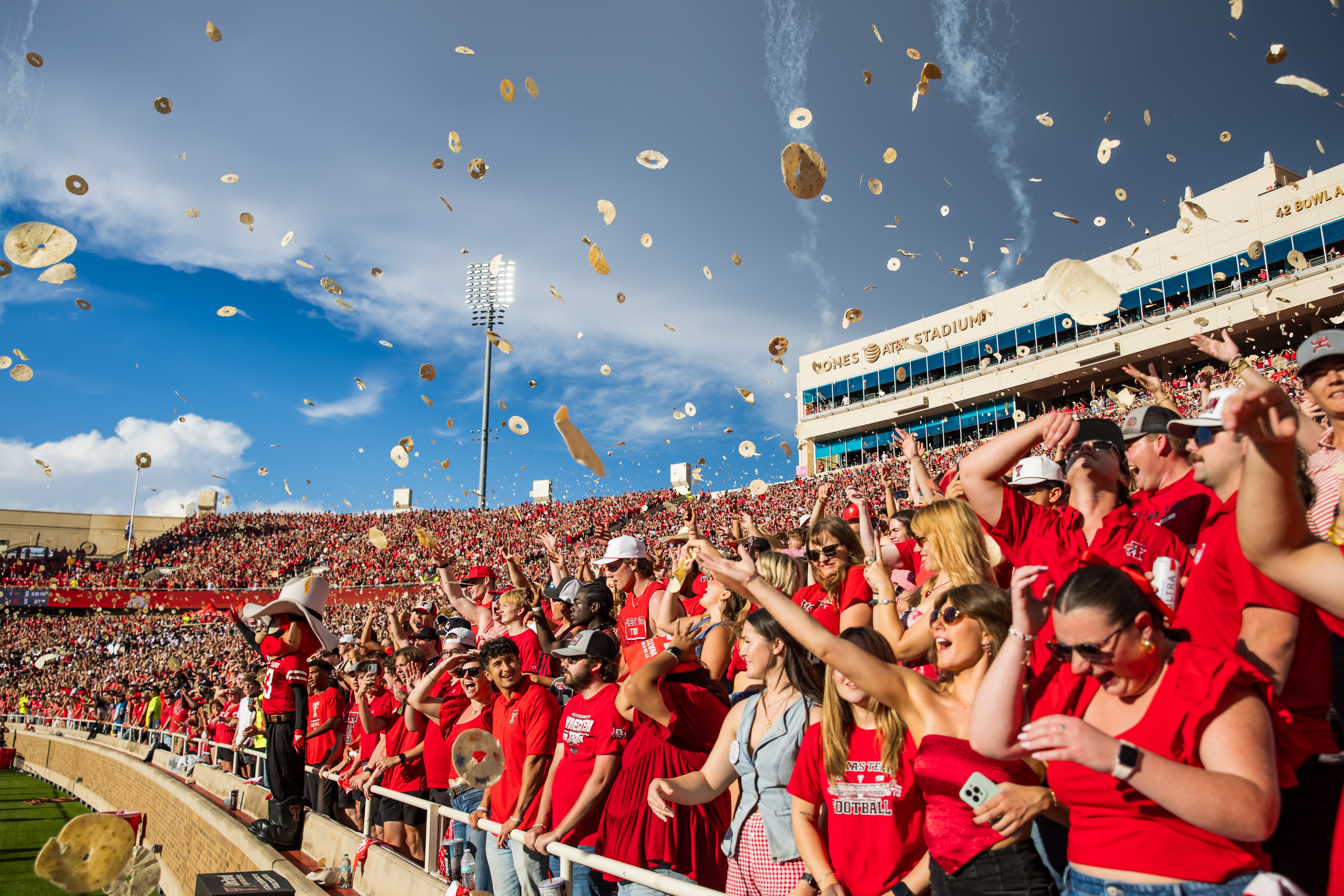 LUBBOCK, TEXAS - AUGUST 30: Texas Tech students throw tortillas for the opening kickoff during the first half of the game between the Texas Tech Red Raiders and the Arkansas-Pine Bluff Golden Lions at Jones AT&T Stadium on August 30, 2025 in Lubbock, Texas