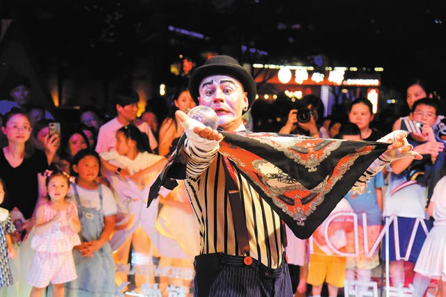 <p>An actor of Cirque du Soleil, a Canadian entertainment group, performs during the Hangzhou X Show in East China’s Zhejiang province, on 10 August</p>