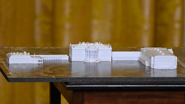 <p>A model of the ballroom is depicted on the left side of this scale model of the White House complex</p>
