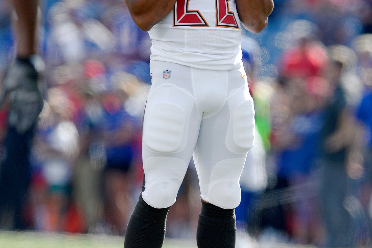 Former NFL player Doug Martin died after struggling with officers while being detained, police say