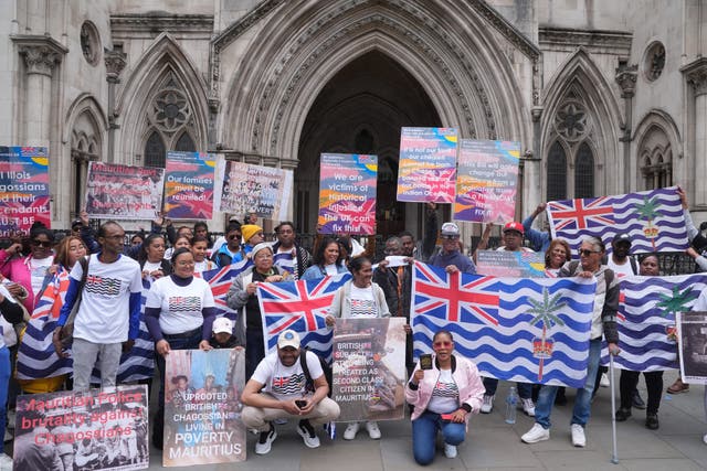 Protesters at the High Court during a hearing over a last-minute block on the Government from concluding its deal on the Chagos Islands (Yui Mok/PA)