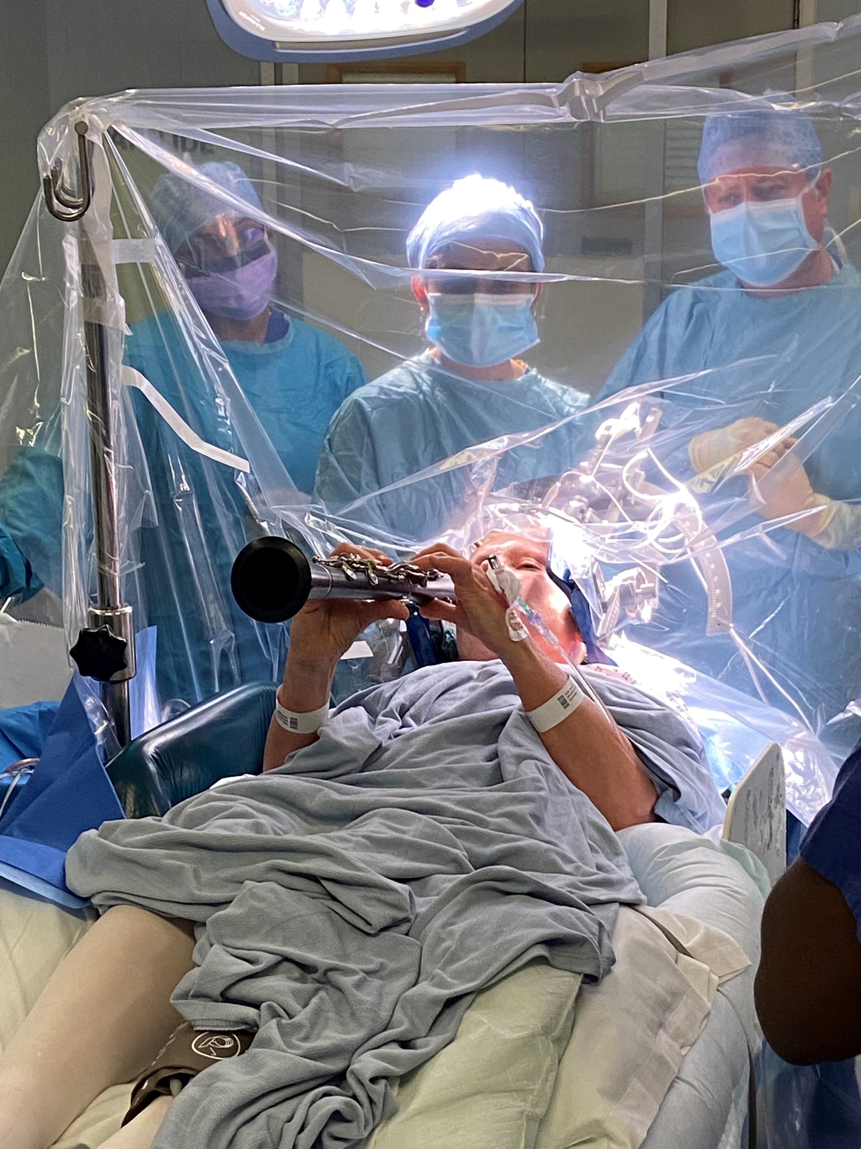 <p>The 65-year-old stayed awake during a four-hour operation at King’s College Hospital</p>