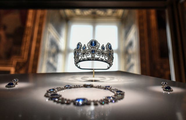 <p>The set of jewellery of Queen Marie-Amelie and Queen Hortense displayed at Apollon's Gallery at the Louvre museum in Paris</p>
