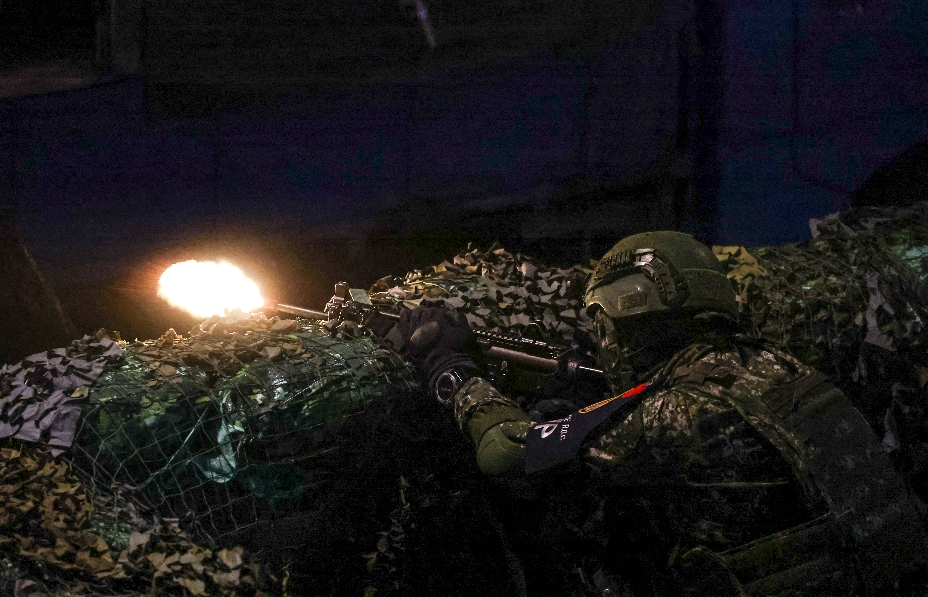 <p>File. Taiwanese soldier fires his weapon during the annual Han Kuang military exercises in Taipei</p>